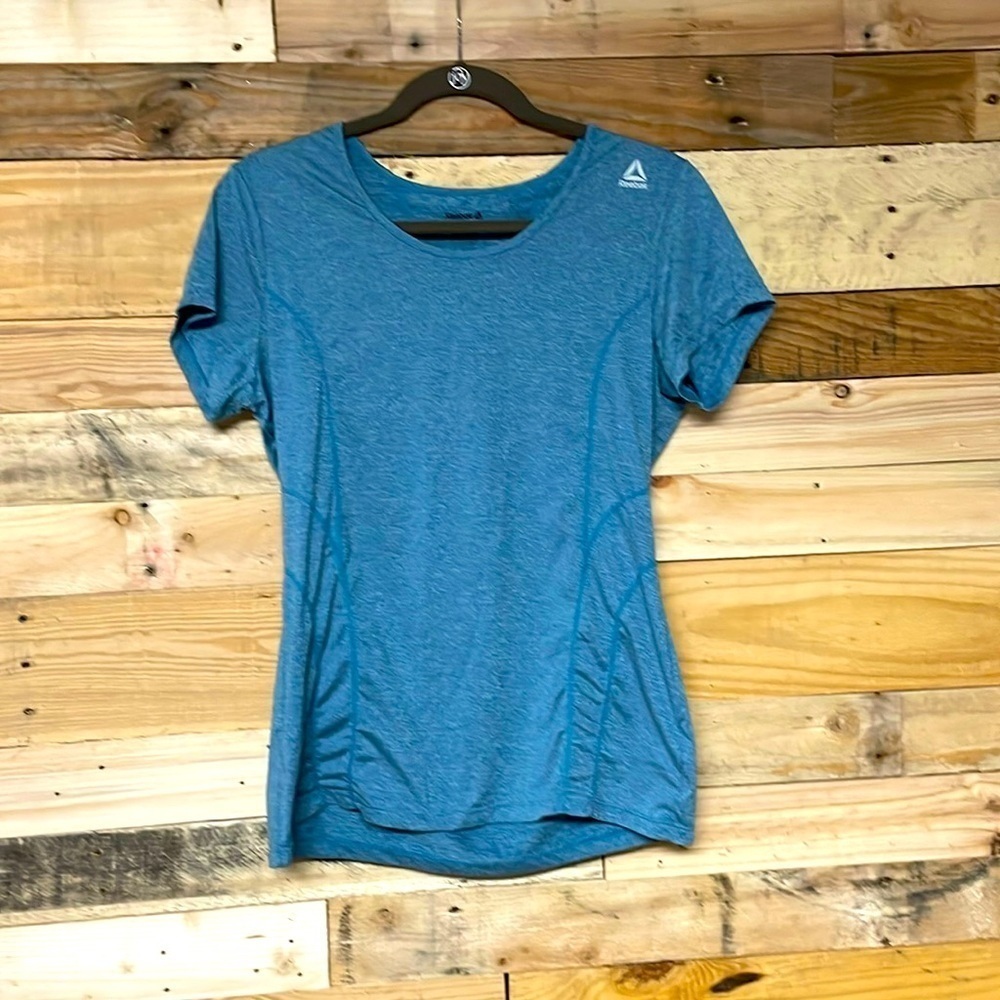 Reebok size medium blue dry wick workout short sleeve shirt